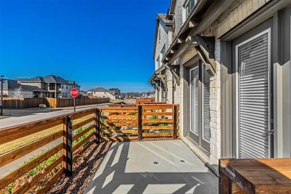 a view of a balcony with city view
