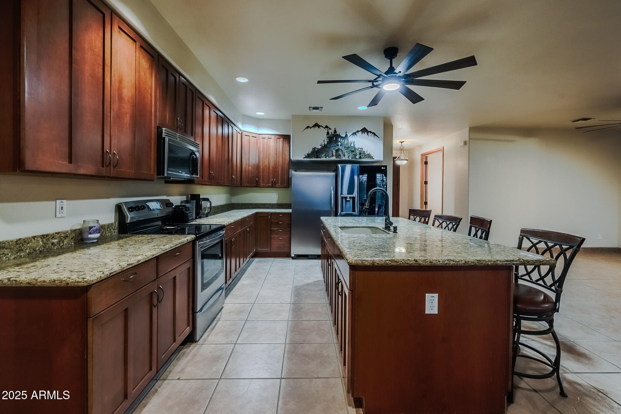 11003 North Hohokam Road Florence, AZ 85132 - Photo 13 of 90 a kitchen with granite countertop cabinets a sink and a counter top space