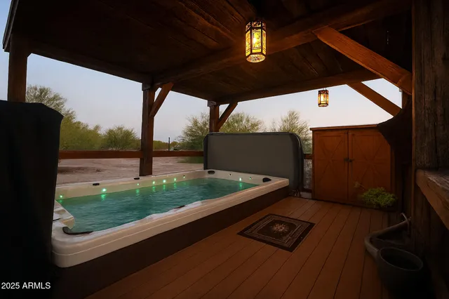 a view of a house with a yard and wooden fence