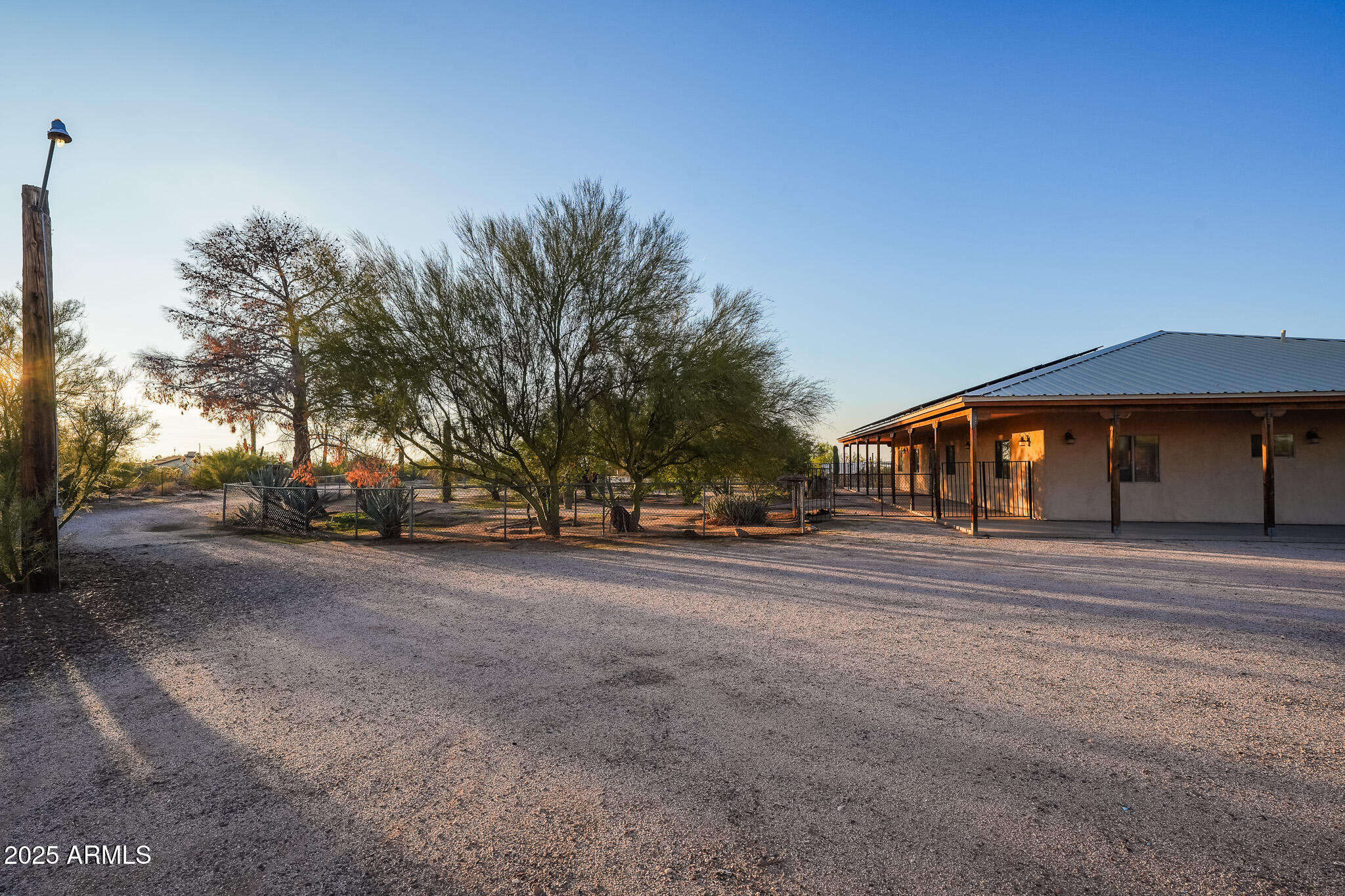 11003 North Hohokam Road Florence, AZ 85132 - Photo 78 of 90 a front view of a house with a yard and garage