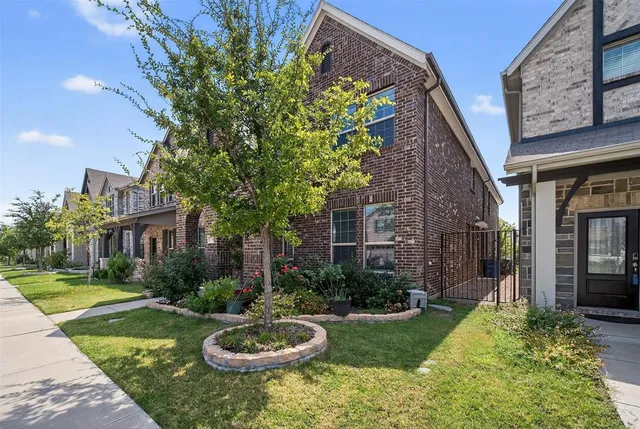 a swimming pool with potted plants and big trees