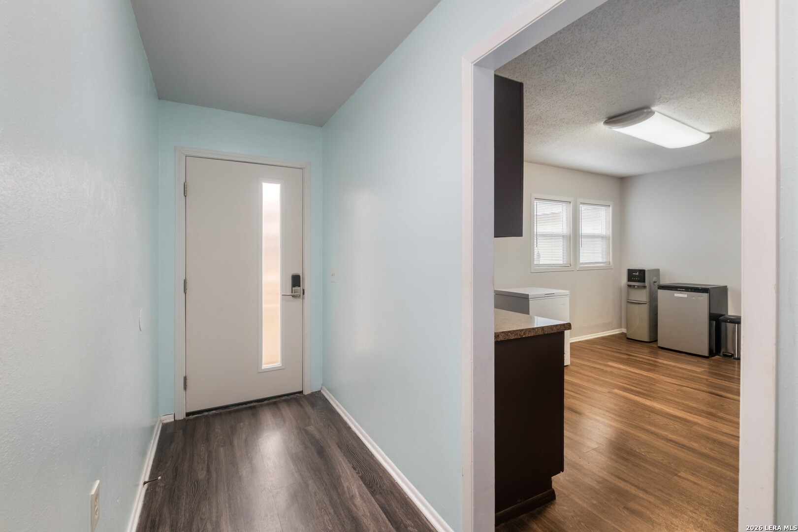 113 Friendswood Path Universal City, TX 78148 - Photo 3 of 30 a view of a kitchen from the hallway