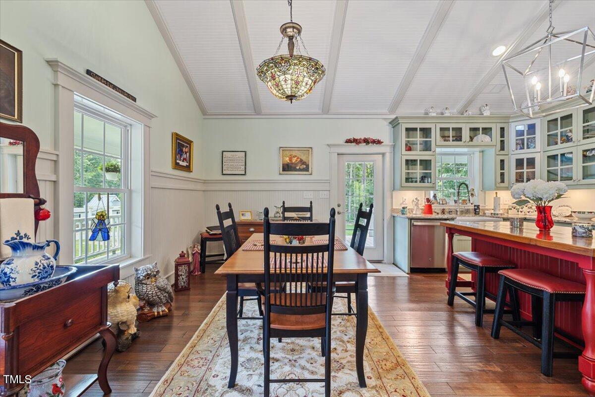 468 Loftis Loop Roxboro, NC 27574 - Photo 11 of 35 a view of a dining room with furniture window and wooden floor
