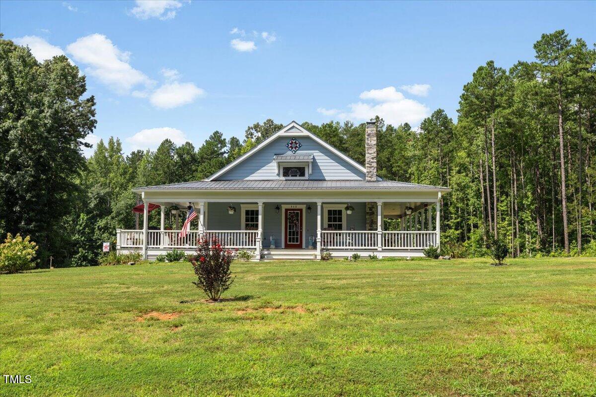 468 Loftis Loop Roxboro, NC 27574 - Photo 2 of 35 a front view of house with yard and green space