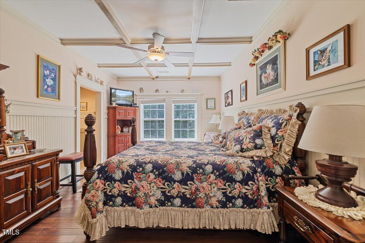 468 Loftis Loop Roxboro, NC 27574 - Photo 25 of 35 a bed sitting in a room next to a window