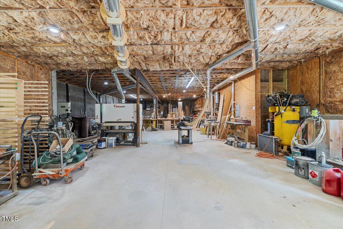 468 Loftis Loop Roxboro, NC 27574 - Photo 29 of 35 a view of a room with gym equipment