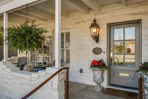a view of balcony with a potted plant