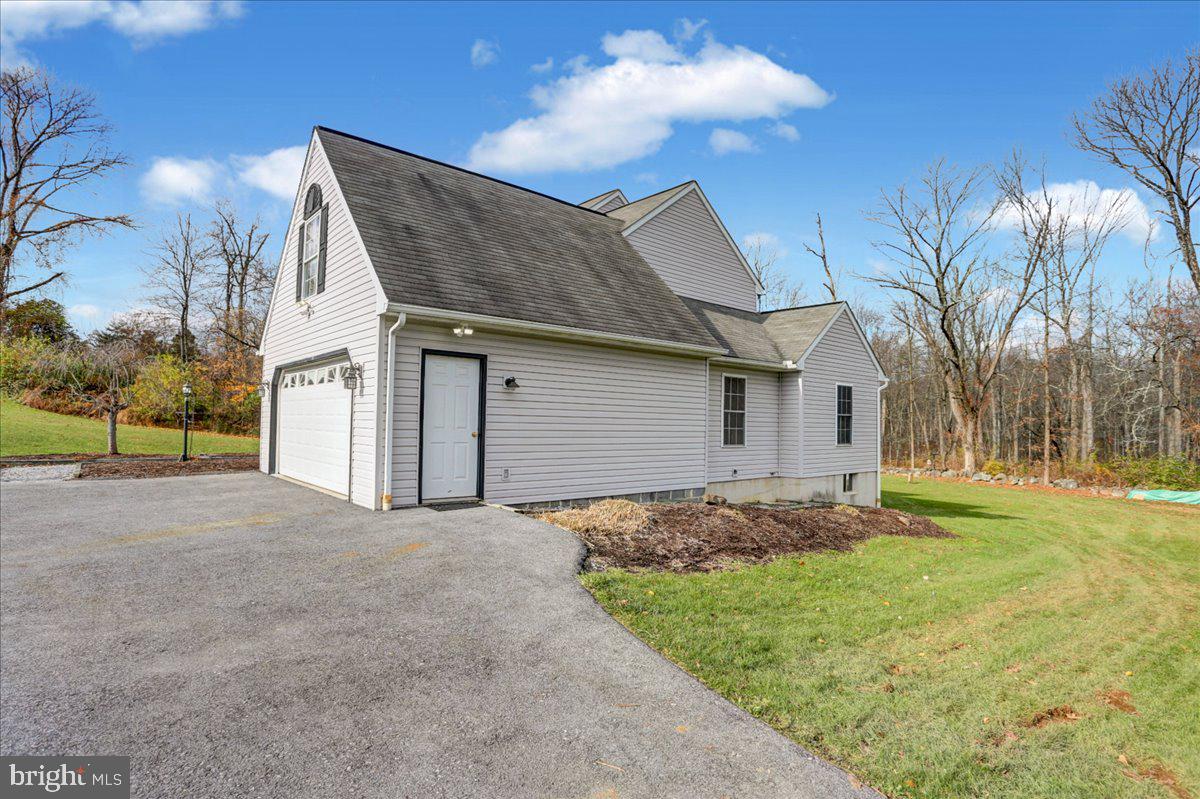 123 Mexico Road Oley, PA 19547 - Photo 40 of 41 a view of a house with a yard and large tree