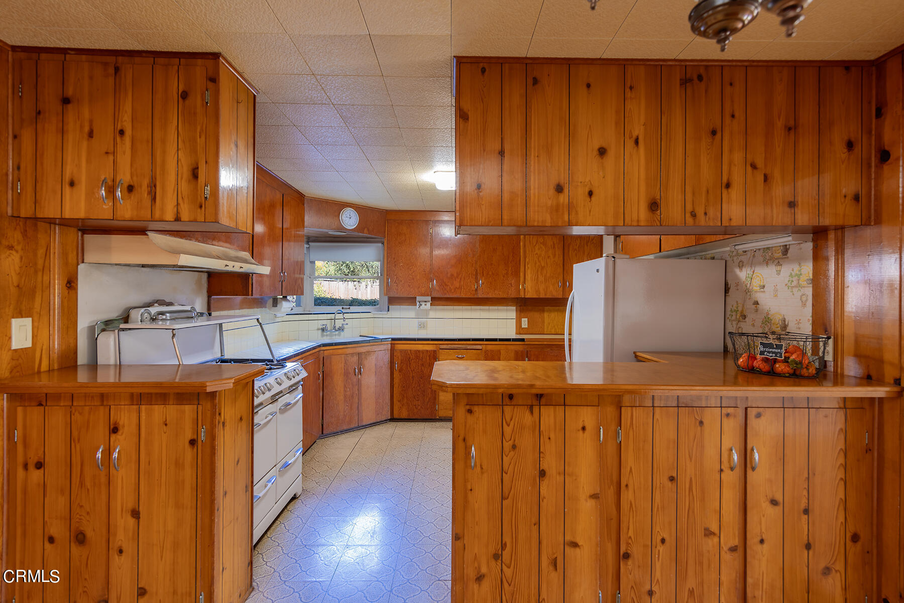 Undisclosed Address Ojai, CA 93023 - Photo 6 of 20 a kitchen with stainless steel appliances wooden cabinets and a sink