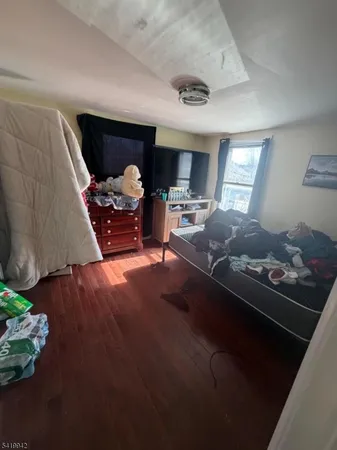 a living room with furniture fireplace and a flat screen tv