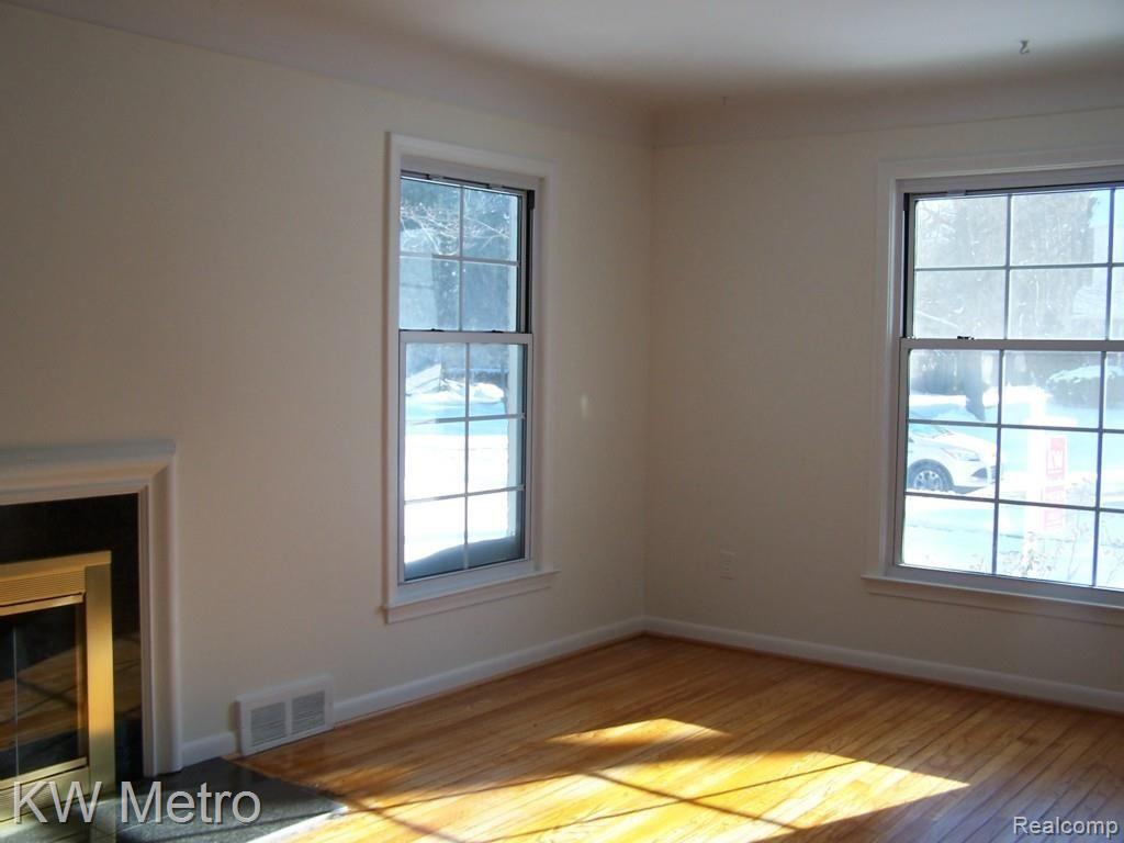 1716 Rosemont Road Berkley, MI 48072 - Photo 11 of 12 Refinished hardwood floors and a fresh coat of paint
