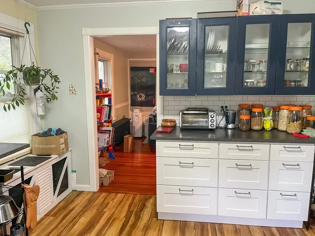 a bedroom with a bed and painted walls