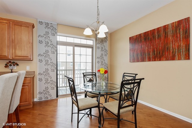 2809 Blakely Lane Naperville, IL 60540 - Photo 5 of 15 a view of a dining room with furniture and window