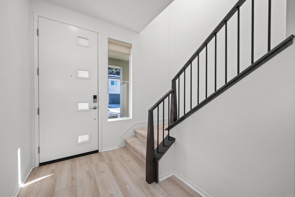 34742 Criollo Way Fallbrook, CA 92028 - Photo 3 of 28 a view of an entryway with wooden floor