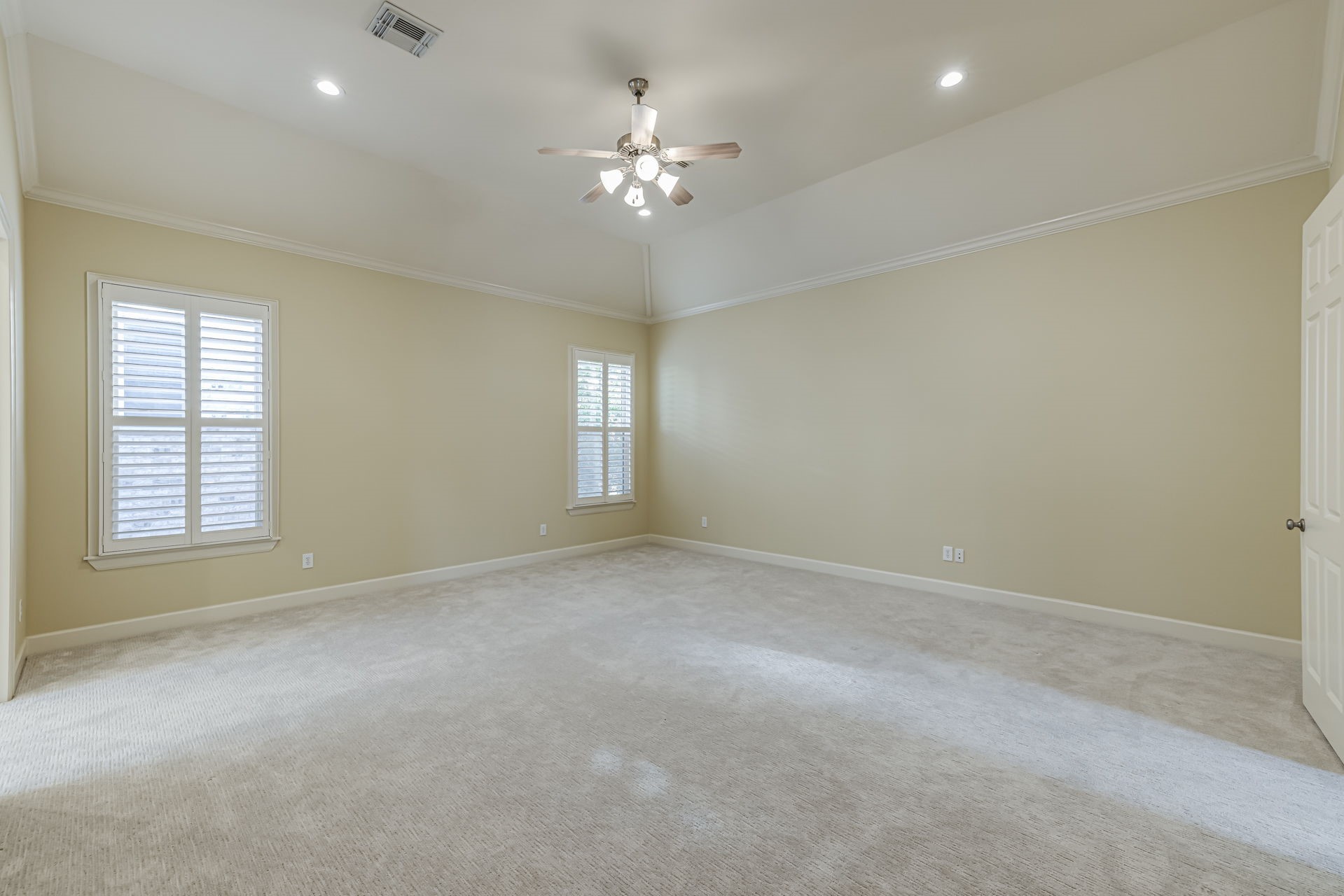 6310 Hermann Lake Drive Houston, TX 77021 - Photo 14 of 39 Huge primary suite with soaring ceilings, not one but two oversize walk-in closets, and a spa-like bath.