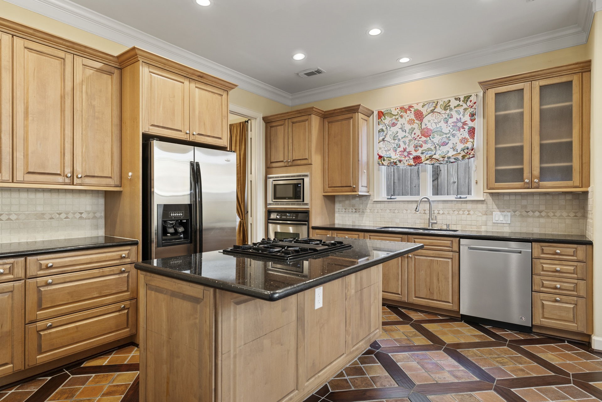 6310 Hermann Lake Drive Houston, TX 77021 - Photo 7 of 39 Beautiful kitchen with gas island cooktop.