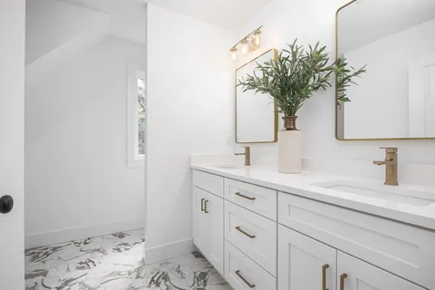 a white bath tub and a shower curtain