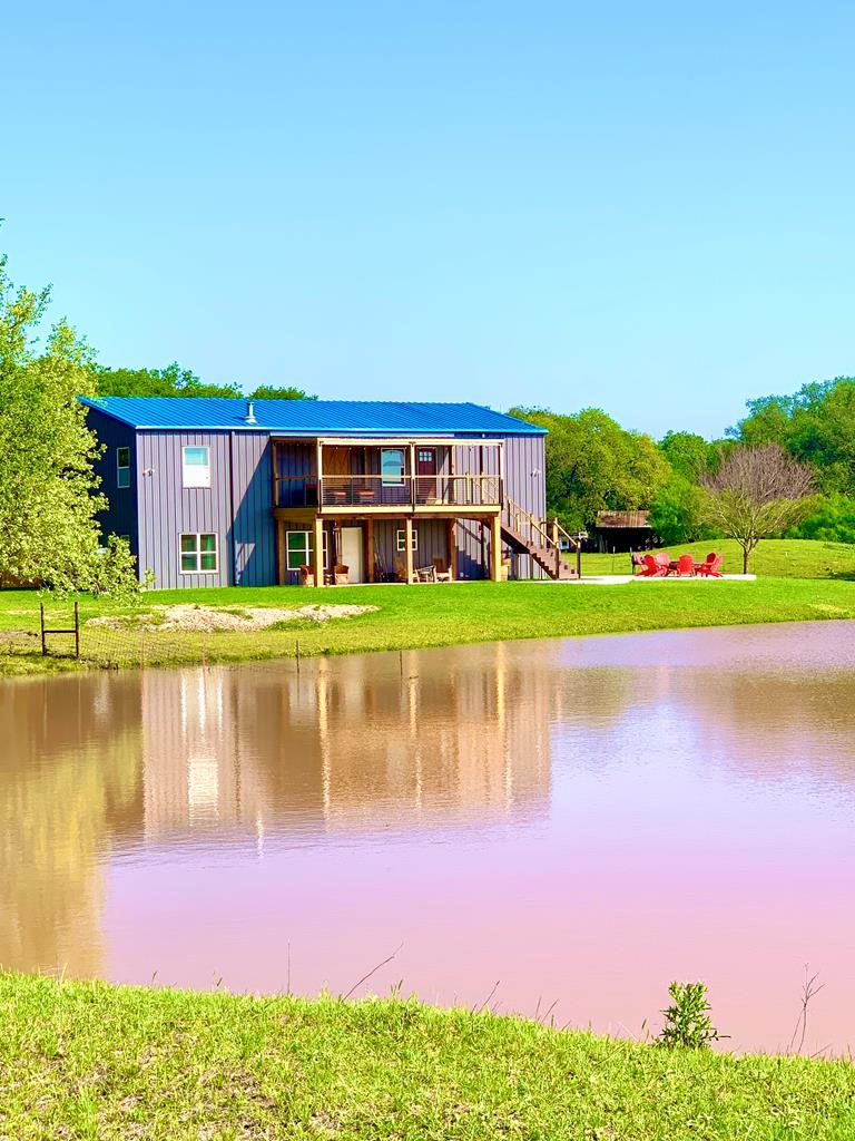 a view of swimming pool with outdoor space and seating area