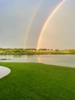 646 Victor Eckhardt Road Fredericksburg, TX 78624 - Photo 2 of 40 a view of a lake with a big yard