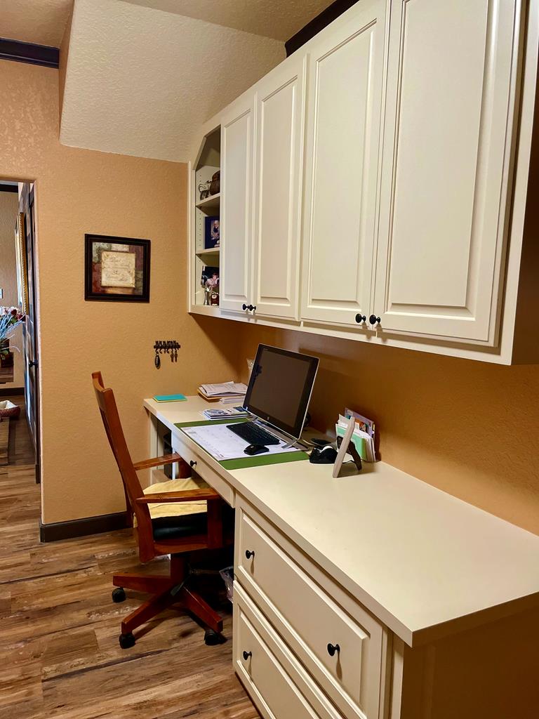 646 Victor Eckhardt Road Fredericksburg, TX 78624 - Photo 23 of 40 a room that has a couch and a table in it