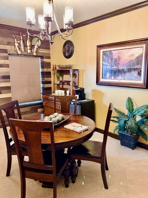 646 Victor Eckhardt Road Fredericksburg, TX 78624 - Photo 38 of 40 a view of a dining room with furniture and a chandelier