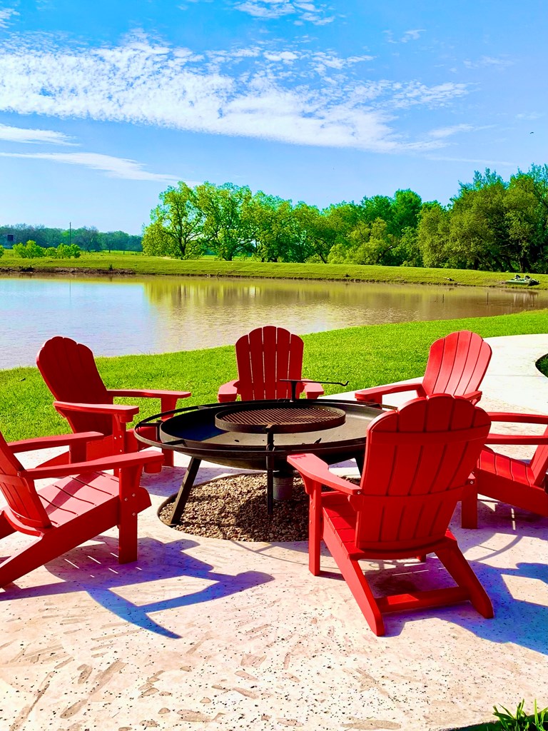 646 Victor Eckhardt Road Fredericksburg, TX 78624 - Photo 10 of 40 a view of a chairs and table on the terrace