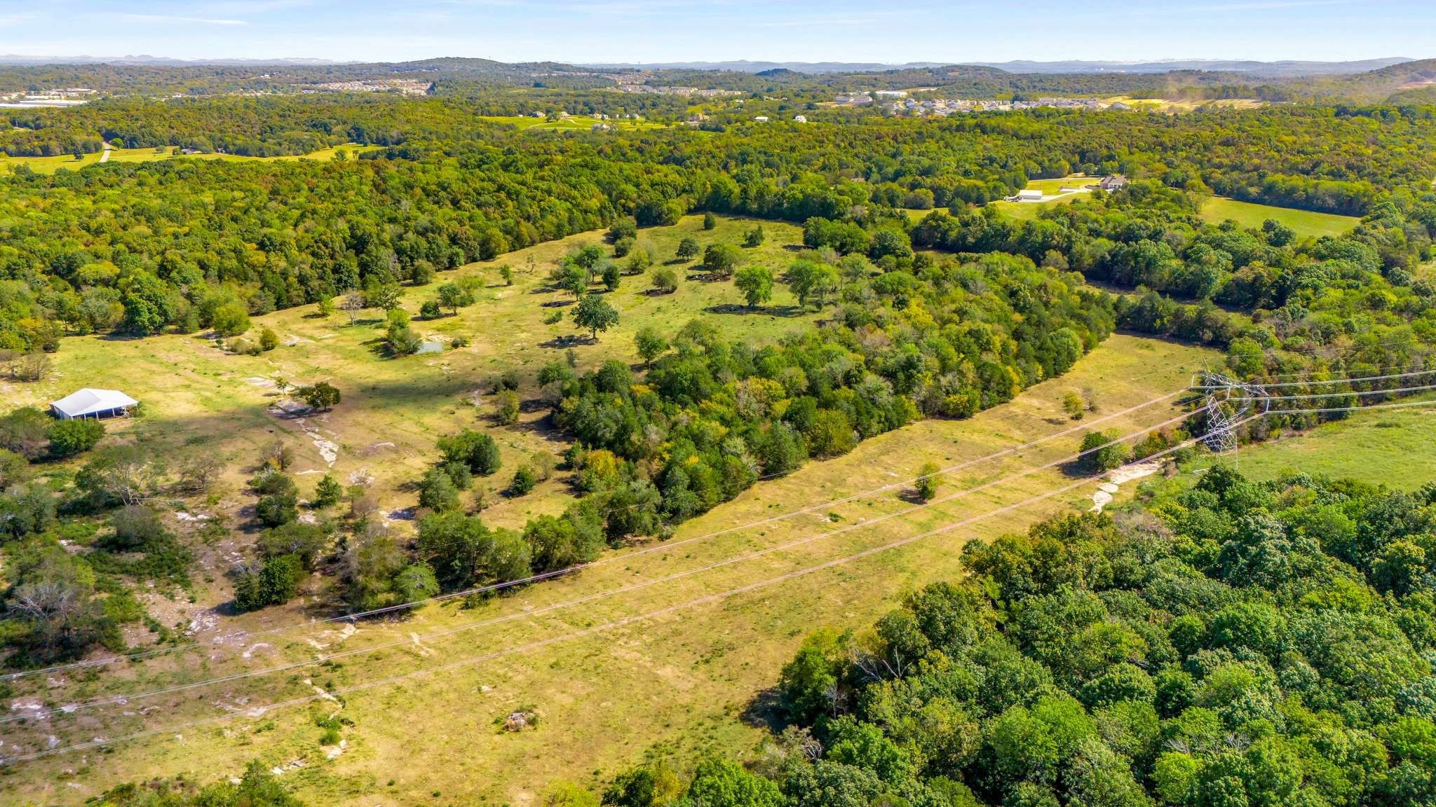 580 Midgett Road Mount Juliet, TN 37122 - Photo 14 of 30 a view of a lake with mountains in the background