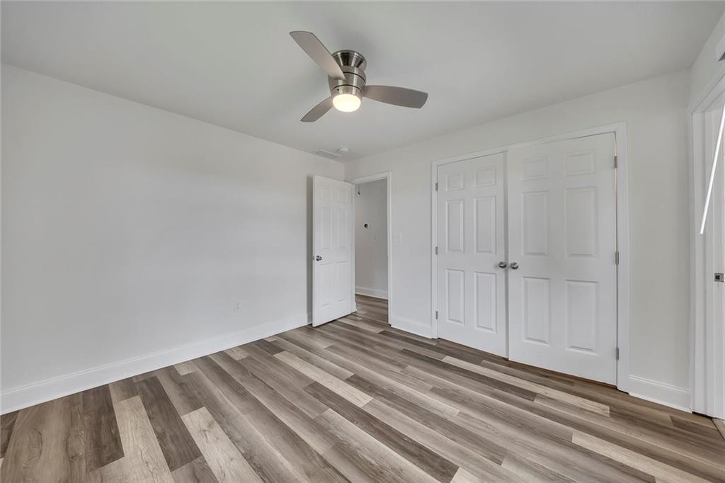 3940 Forrest Court Chamblee, GA 30341 - Photo 20 of 35 wooden floor in an empty room