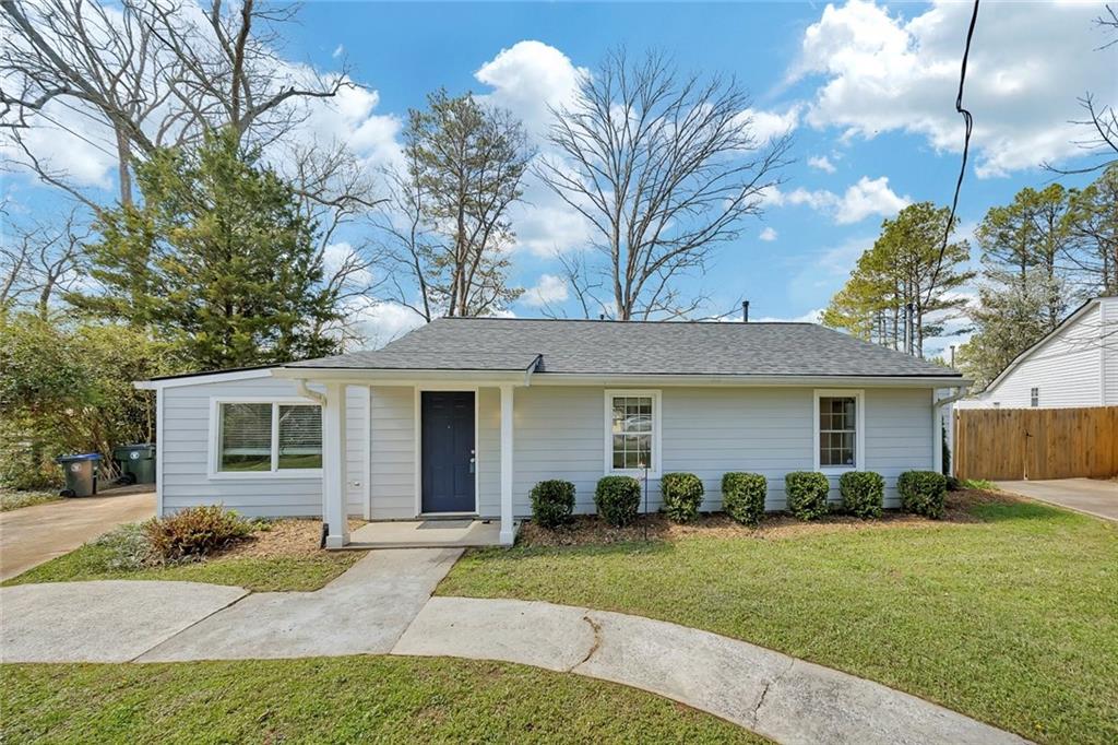3940 Forrest Court Chamblee, GA 30341 - Photo 3 of 35 a view of a house with backyard and a tree