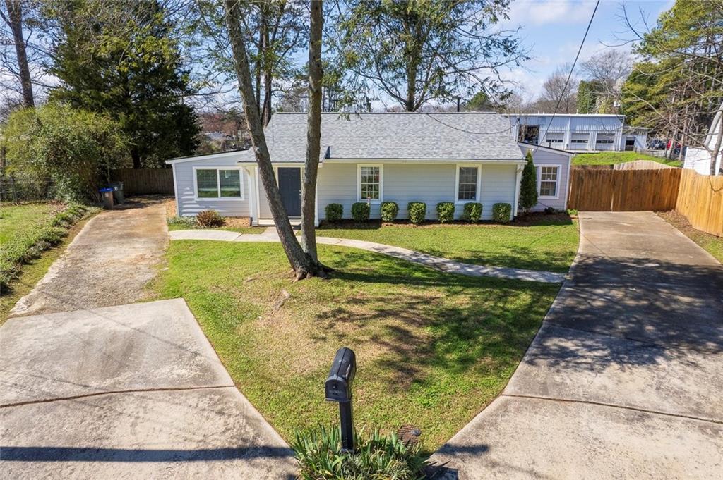 3940 Forrest Court Chamblee, GA 30341 - Photo 33 of 35 a front view of a house with a yard