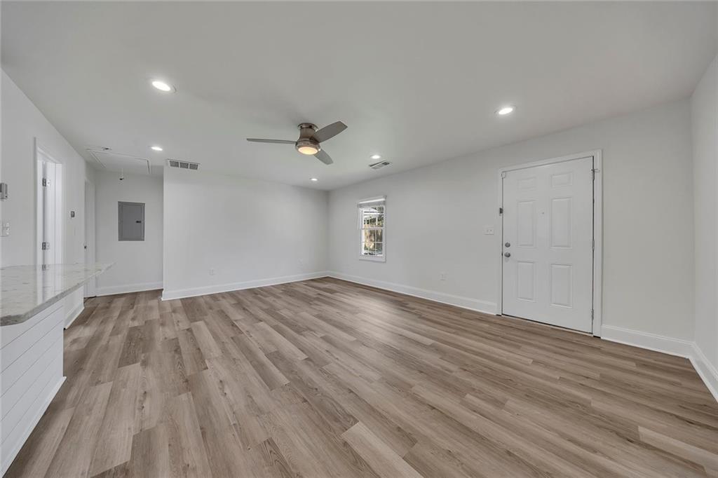 3940 Forrest Court Chamblee, GA 30341 - Photo 8 of 35 a view of an empty room with wooden floor
