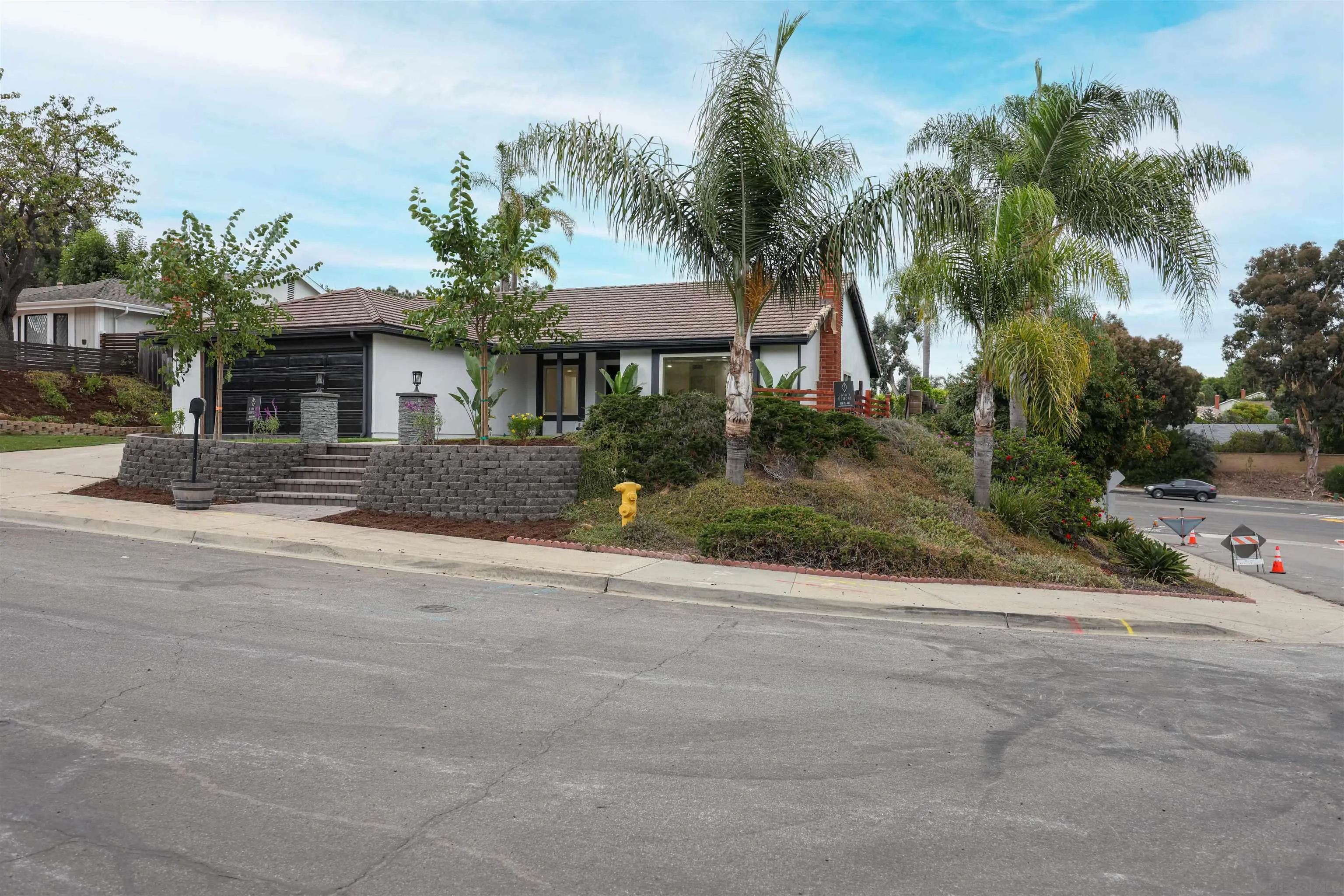 837 Elmview Drive Encinitas, CA 92024 - Photo 2 of 27 a front view of a house with a yard and garage