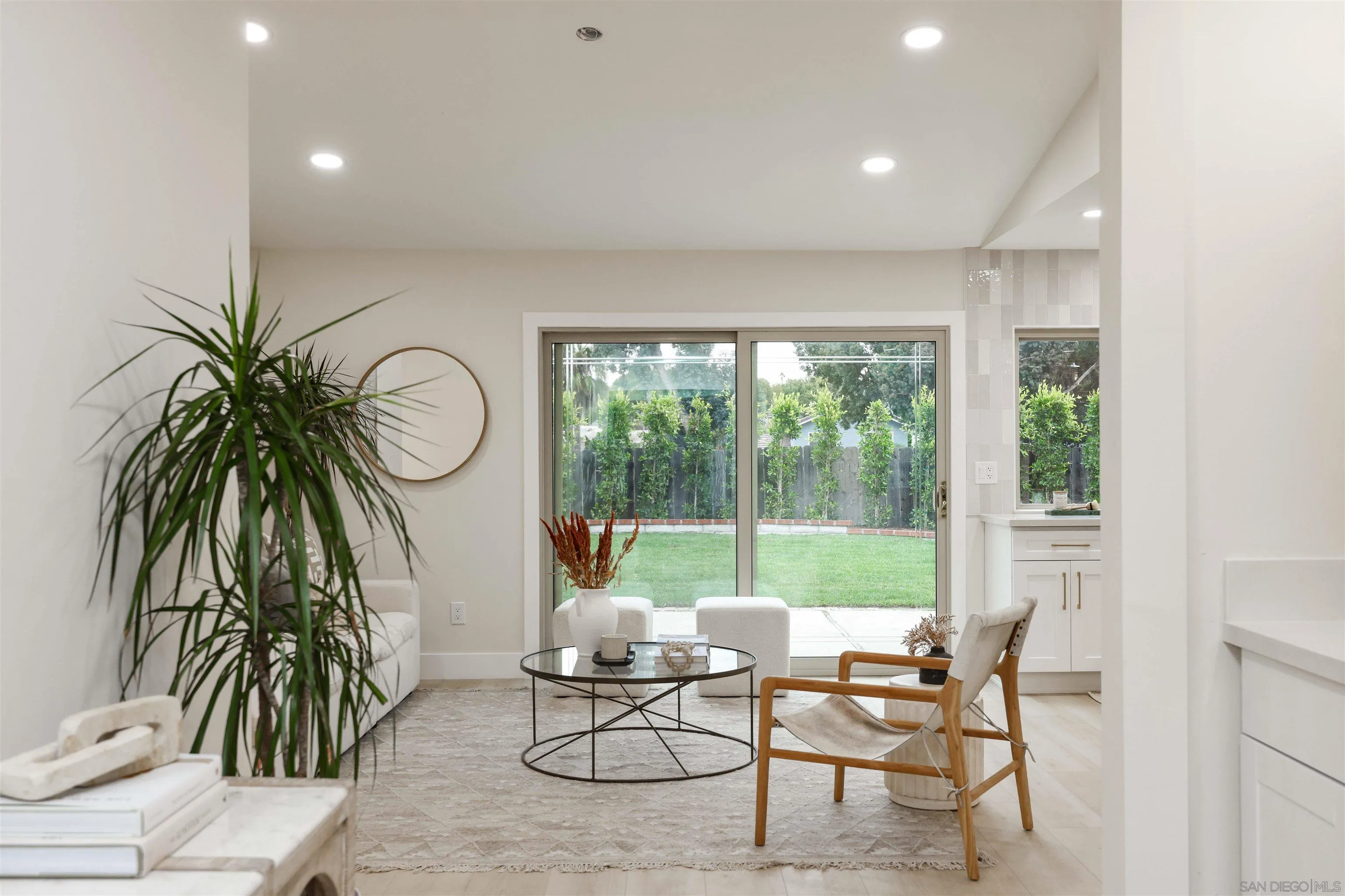 837 Elmview Drive Encinitas, CA 92024 - Photo 4 of 27 a living room with furniture and a large window