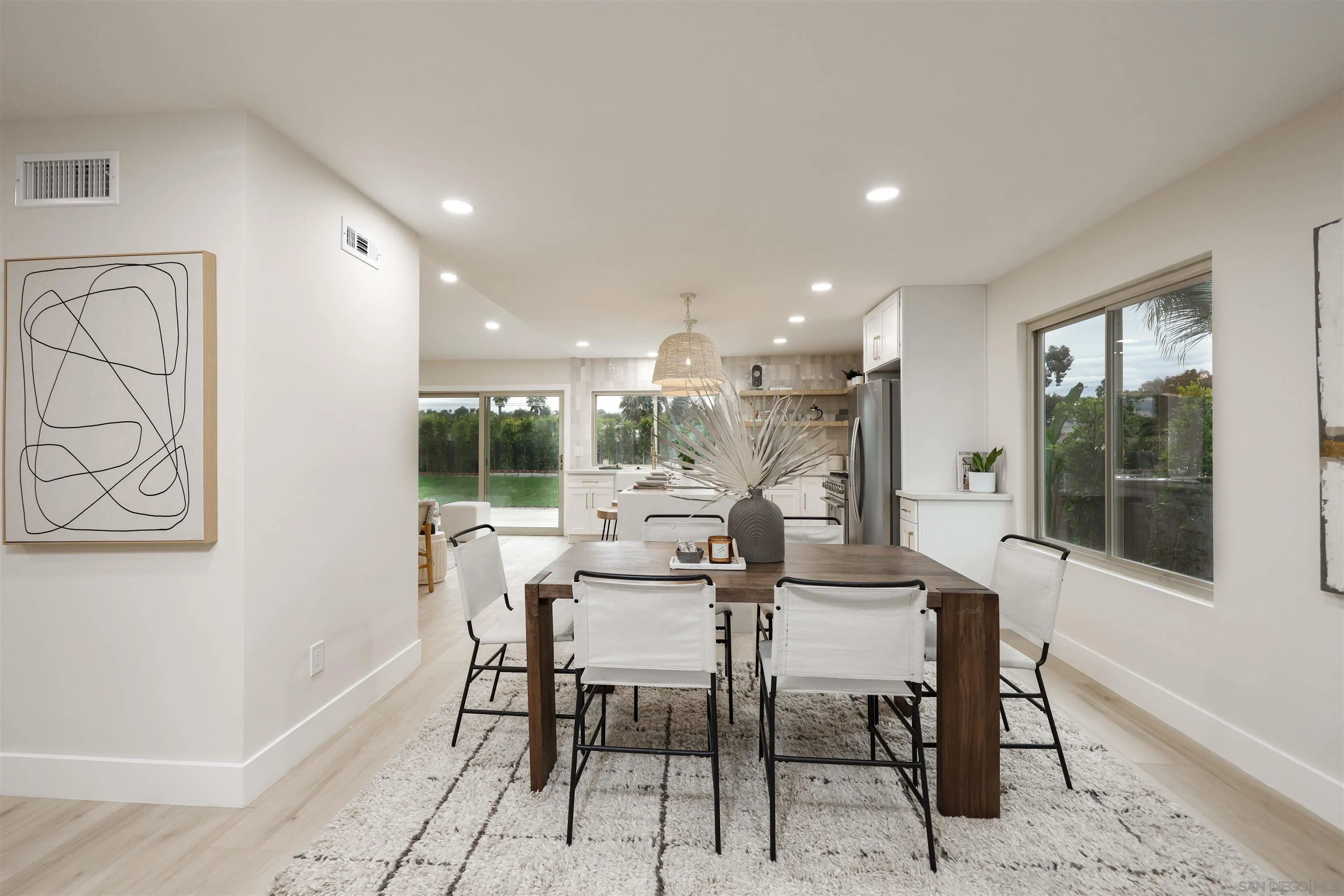 837 Elmview Drive Encinitas, CA 92024 - Photo 6 of 27 a view of a dining room with furniture window and outside view