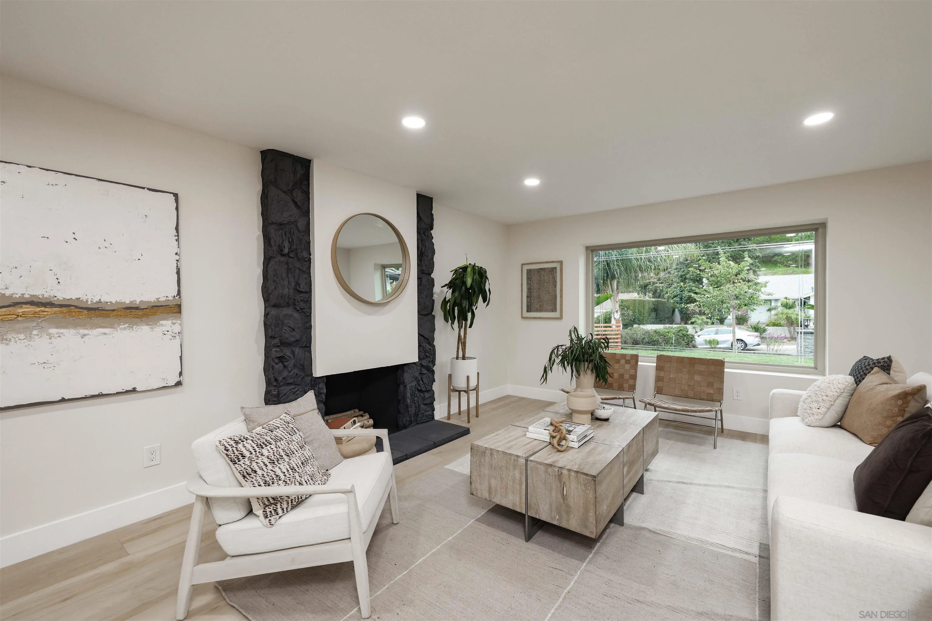 837 Elmview Drive Encinitas, CA 92024 - Photo 7 of 27 a living room with furniture and a large window