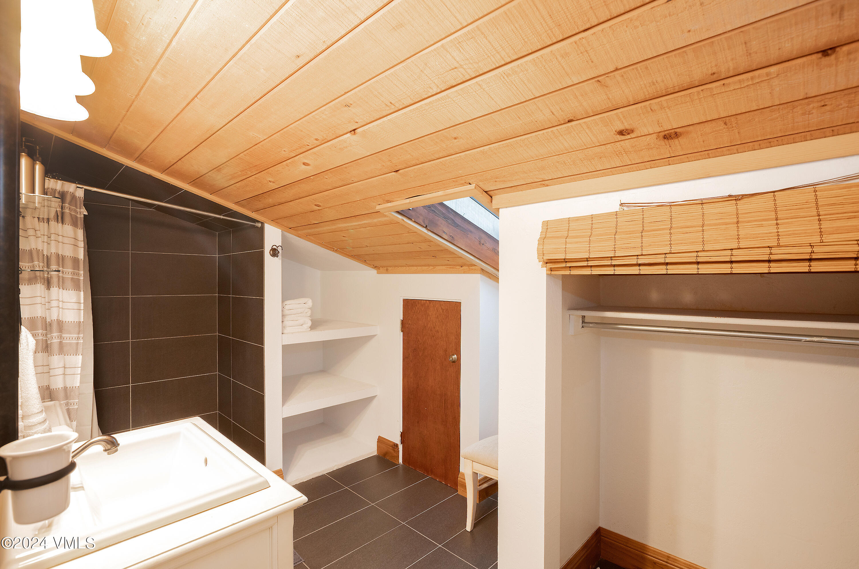 442 South Frontage Road East, Unit 306B Vail, CO 81657 - Photo 7 of 11 a view of walk in closet with empty racks