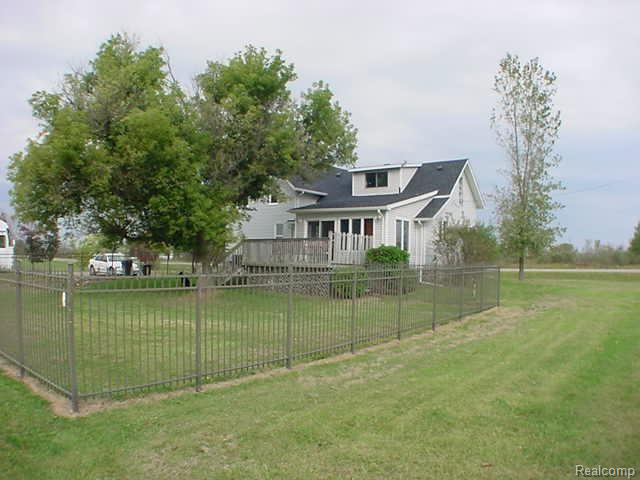 15319 Imlay City Road Capac, MI 48014 - Photo 10 of 11 Imaly City Fenced Backyard