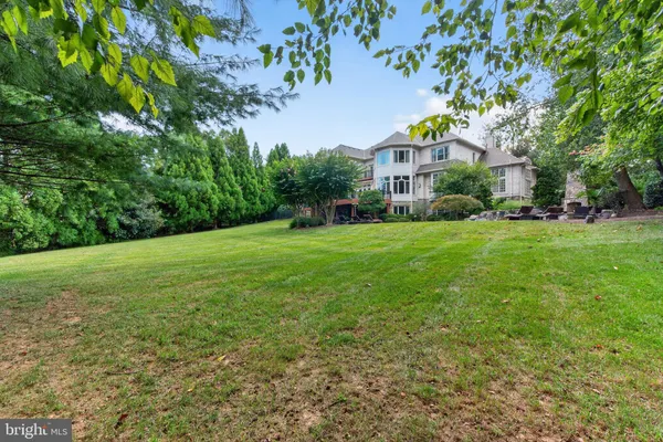 a bathroom with a sink double vanity and a mirror