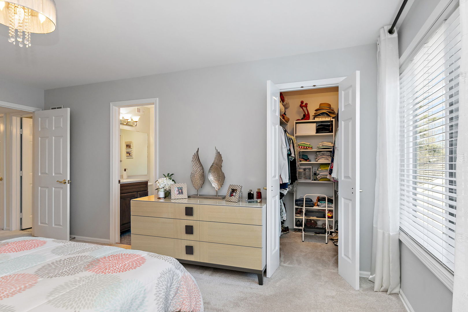 260 Timber Ridge Lane, Unit A Lake Barrington, IL 60010 - Photo 18 of 34 a bedroom with a bed and a cabinets