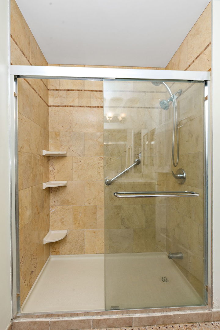 260 Timber Ridge Lane, Unit A Lake Barrington, IL 60010 - Photo 20 of 34 a bathroom with a shower