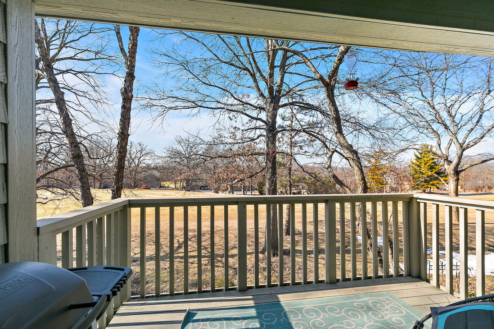 260 Timber Ridge Lane, Unit A Lake Barrington, IL 60010 - Photo 22 of 34 a view of a wooden street from a balcony