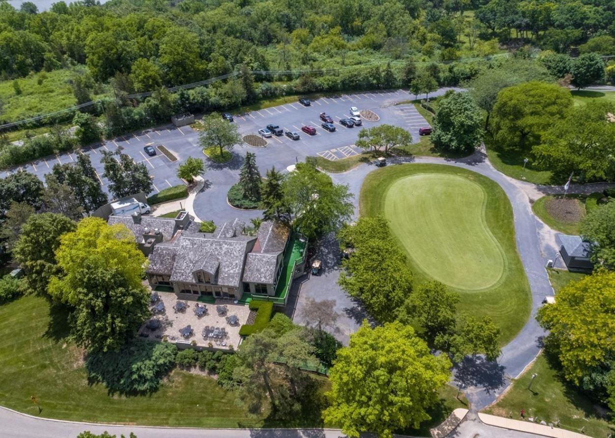 260 Timber Ridge Lane, Unit A Lake Barrington, IL 60010 - Photo 31 of 34 an aerial view of a house with a swimming pool yard and outdoor seating