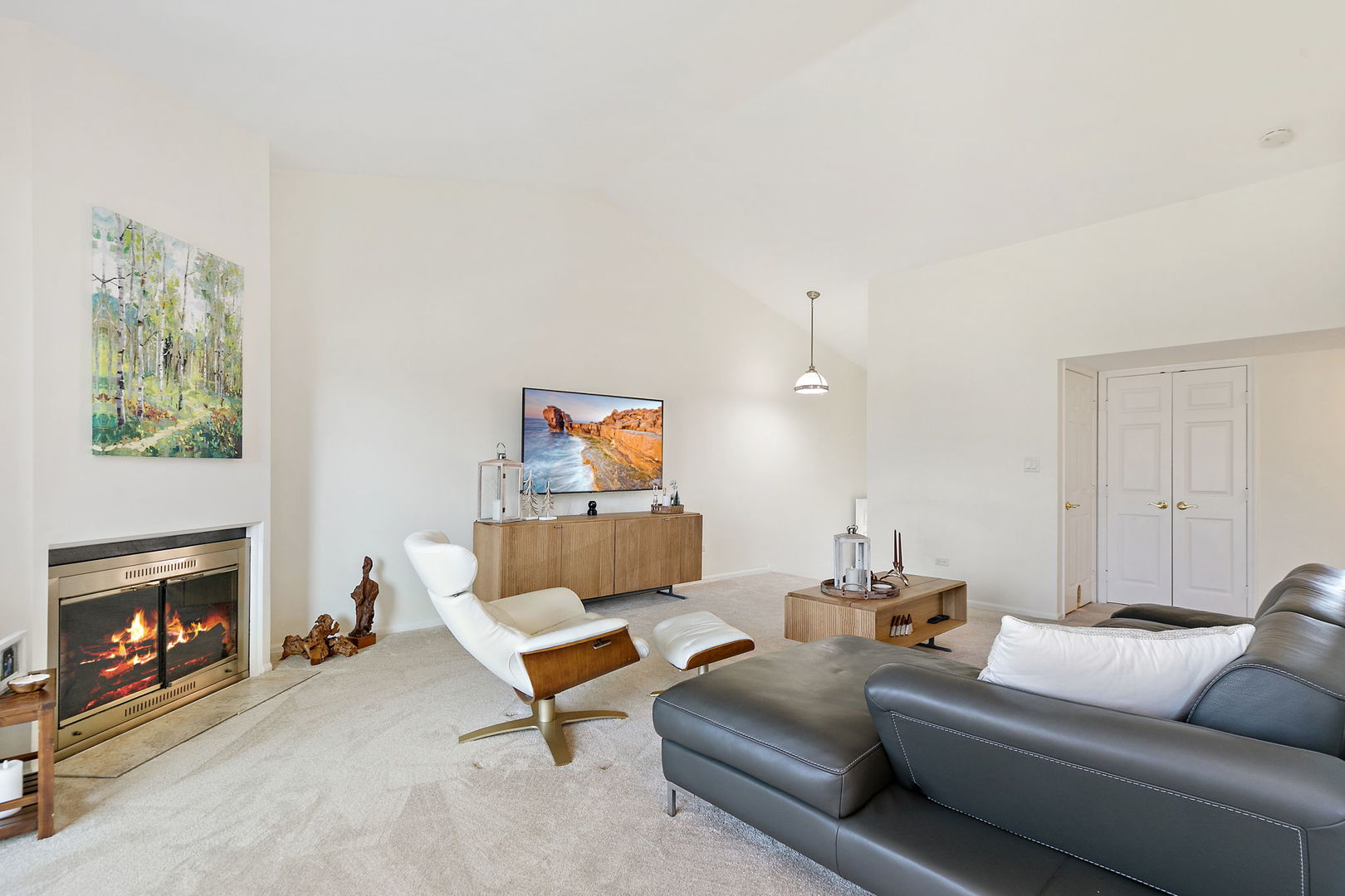 260 Timber Ridge Lane, Unit A Lake Barrington, IL 60010 - Photo 4 of 34 a living room with furniture and a fireplace