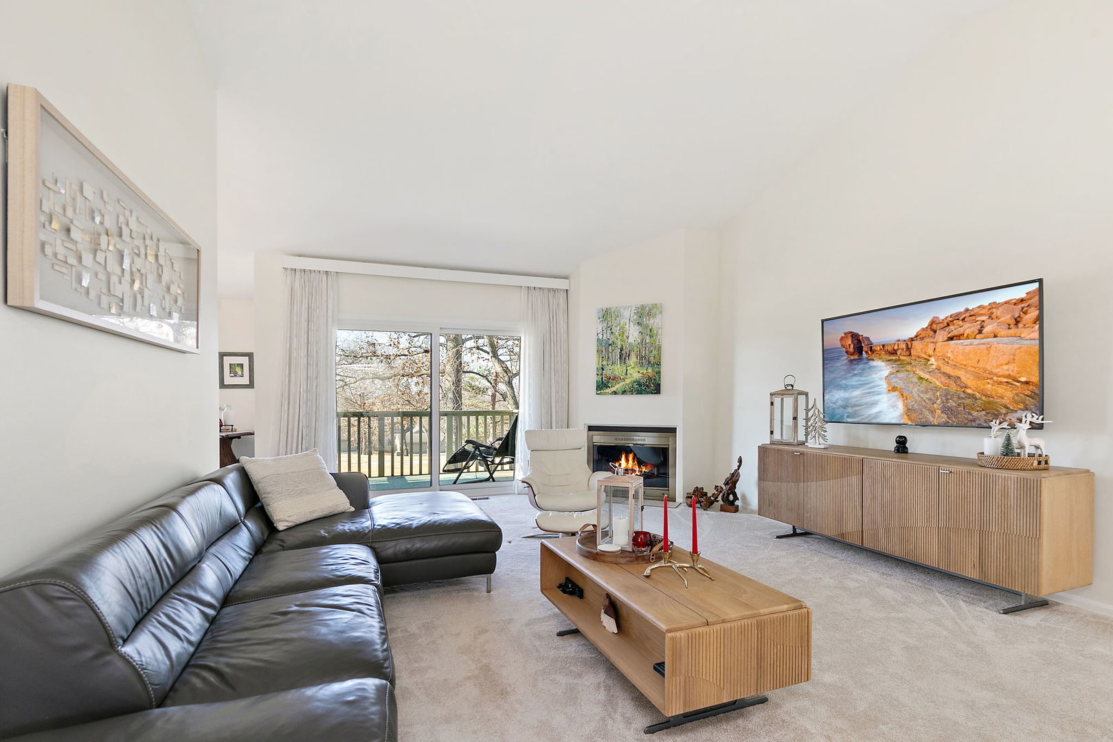 260 Timber Ridge Lane, Unit A Lake Barrington, IL 60010 - Photo 5 of 34 a living room with furniture and a flat screen tv
