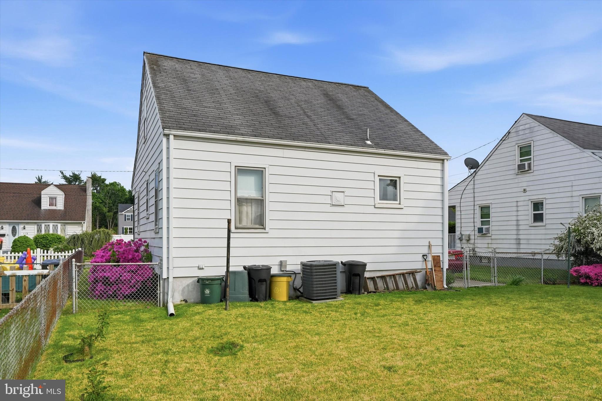 100 Wagner Street Hamilton, NJ 08610 - Photo 15 of 15 a backyard of a house with table and chairs