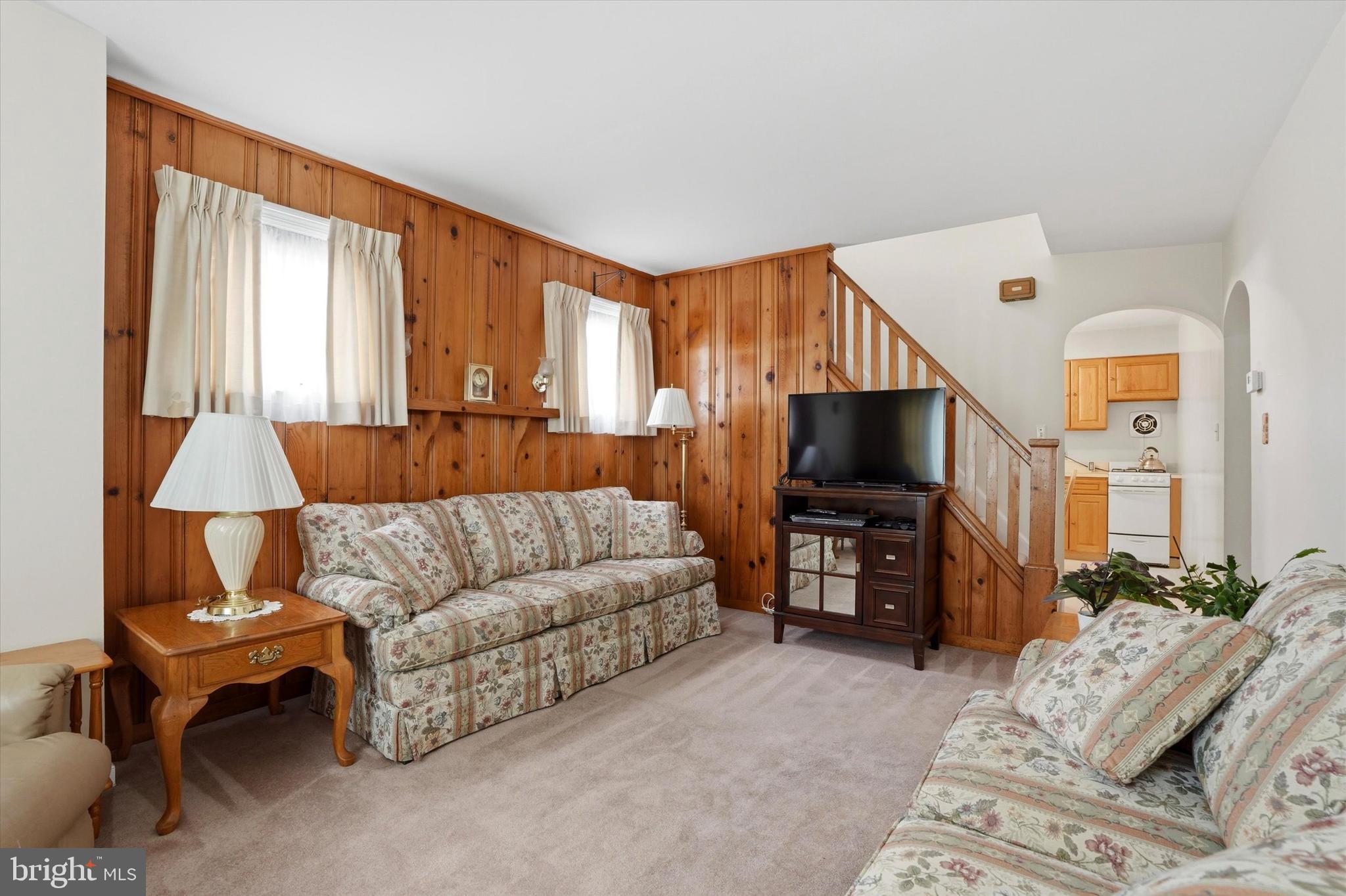 100 Wagner Street Hamilton, NJ 08610 - Photo 2 of 15 a living room with furniture and a flat screen tv