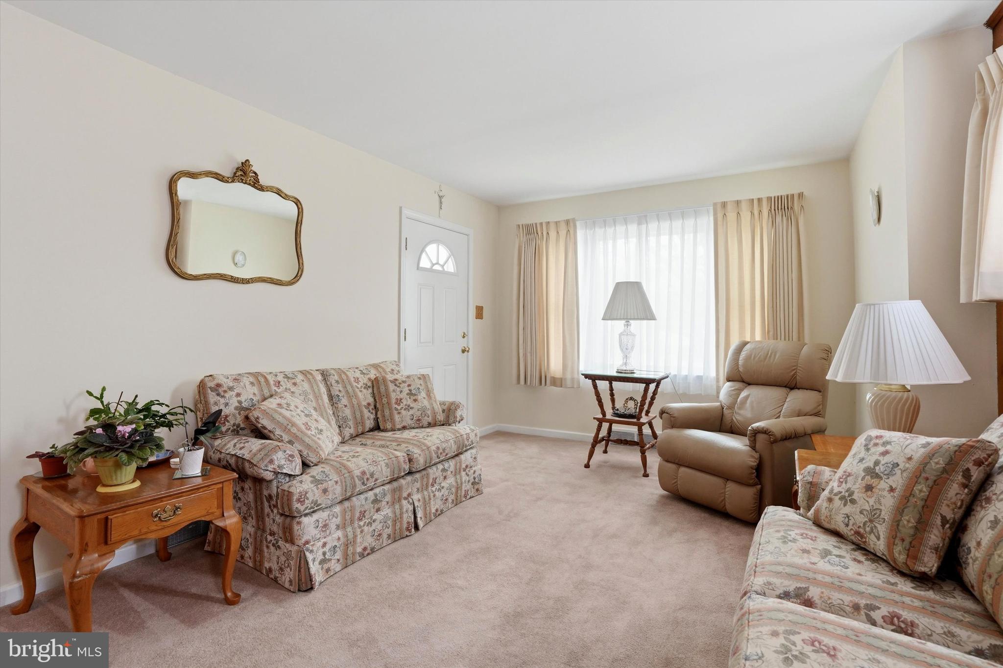 100 Wagner Street Hamilton, NJ 08610 - Photo 3 of 15 a living room with furniture and a window