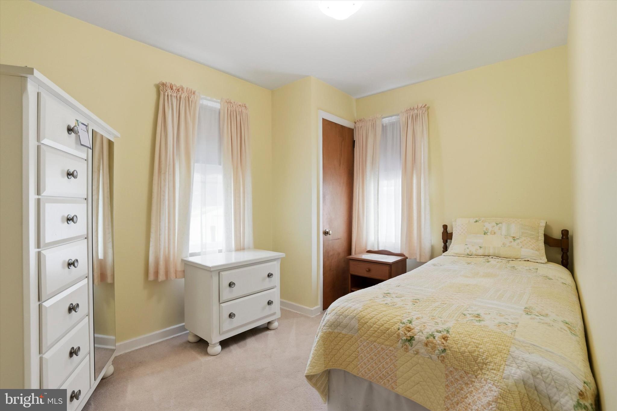 100 Wagner Street Hamilton, NJ 08610 - Photo 5 of 15 a bedroom with a bed and a window