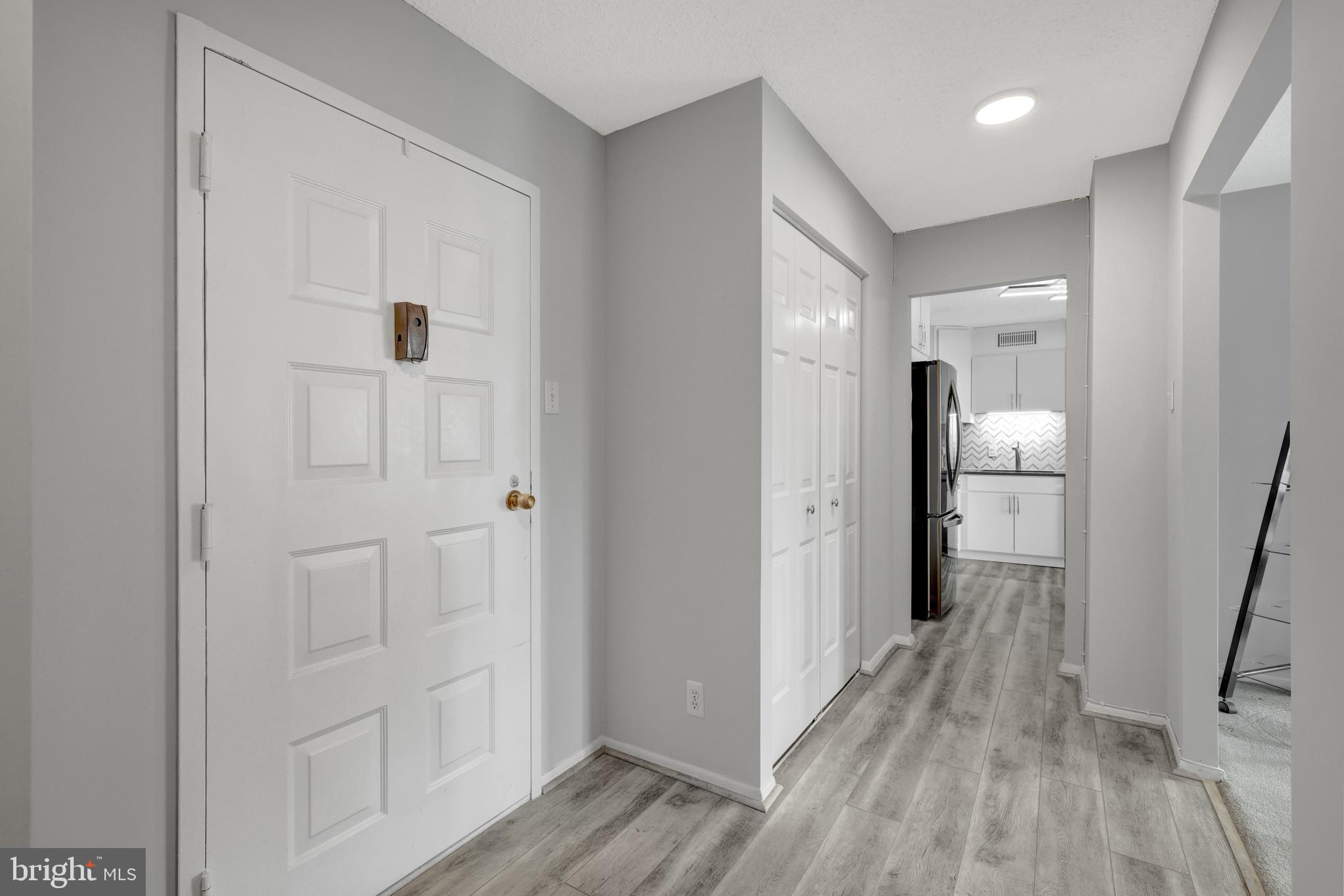 6800 Fleetwood Road, Unit 810 McLean, VA 22101 - Photo 2 of 30 a view of hallway with wooden floor