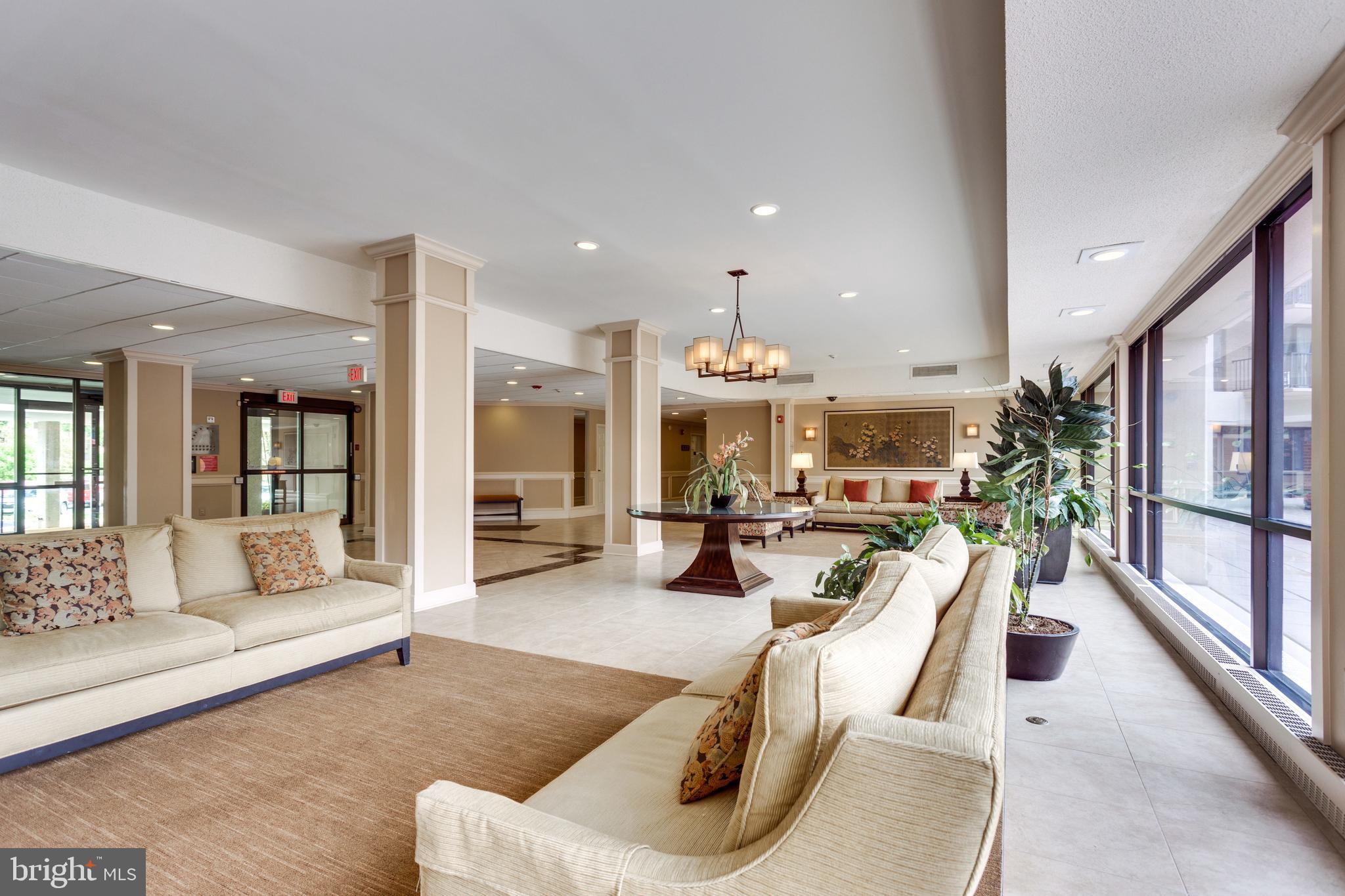 6800 Fleetwood Road, Unit 810 McLean, VA 22101 - Photo 25 of 30 a living room with furniture and a large window